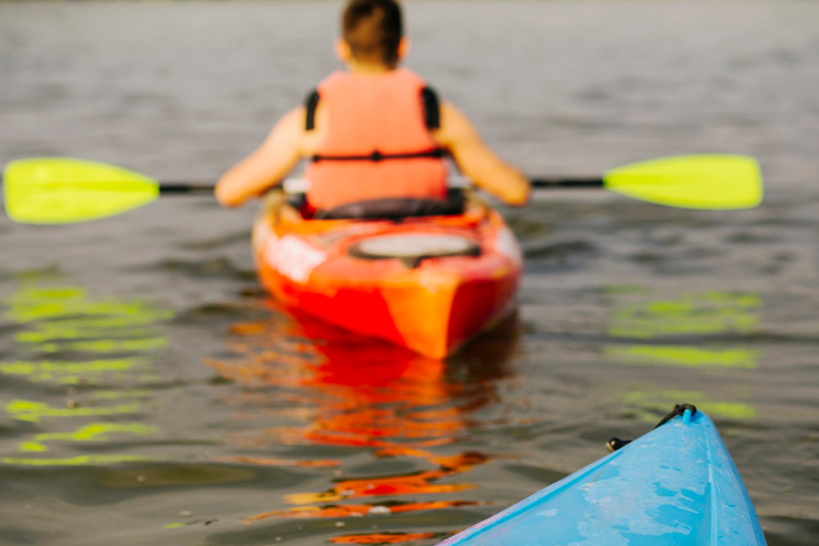 rear-view-man-kayaking